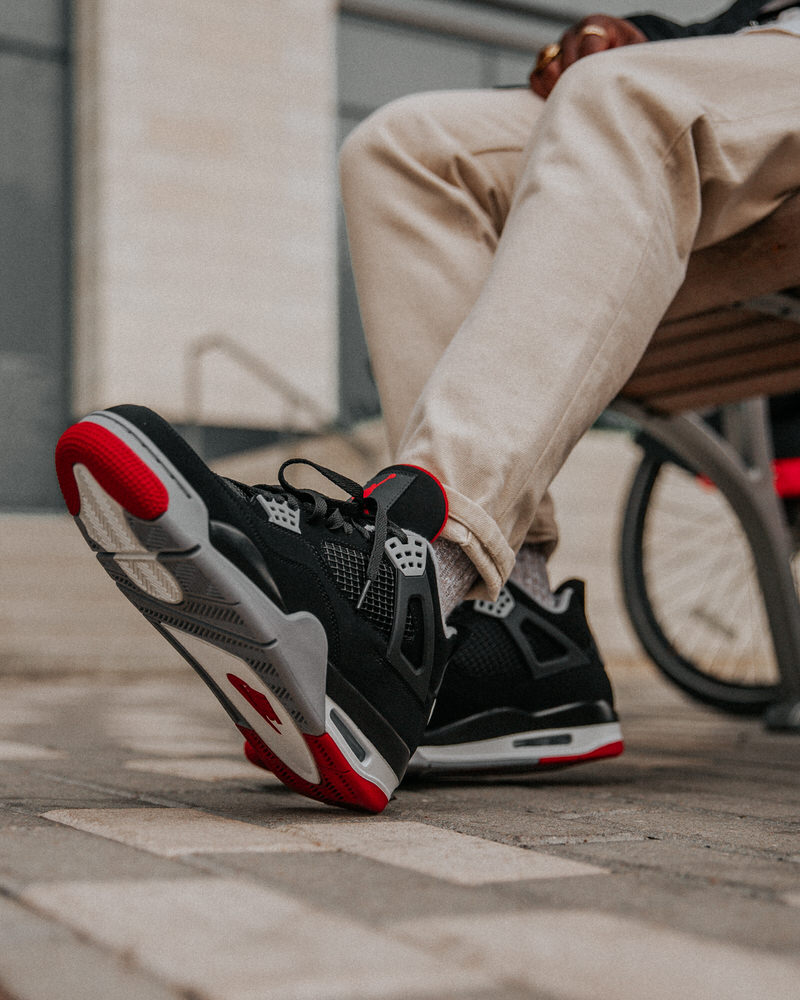 jordan 4 retro bred on feet