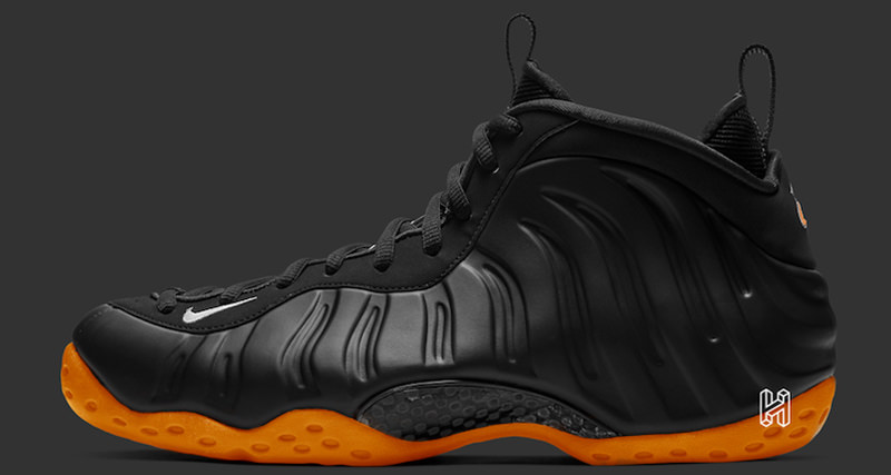 silver black and orange foamposites