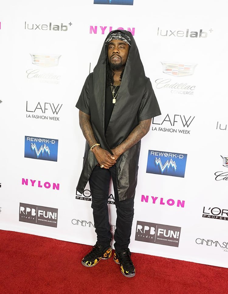 Wale showing off the Supreme x Nike Air Foamposite One with his fashion forward influence.