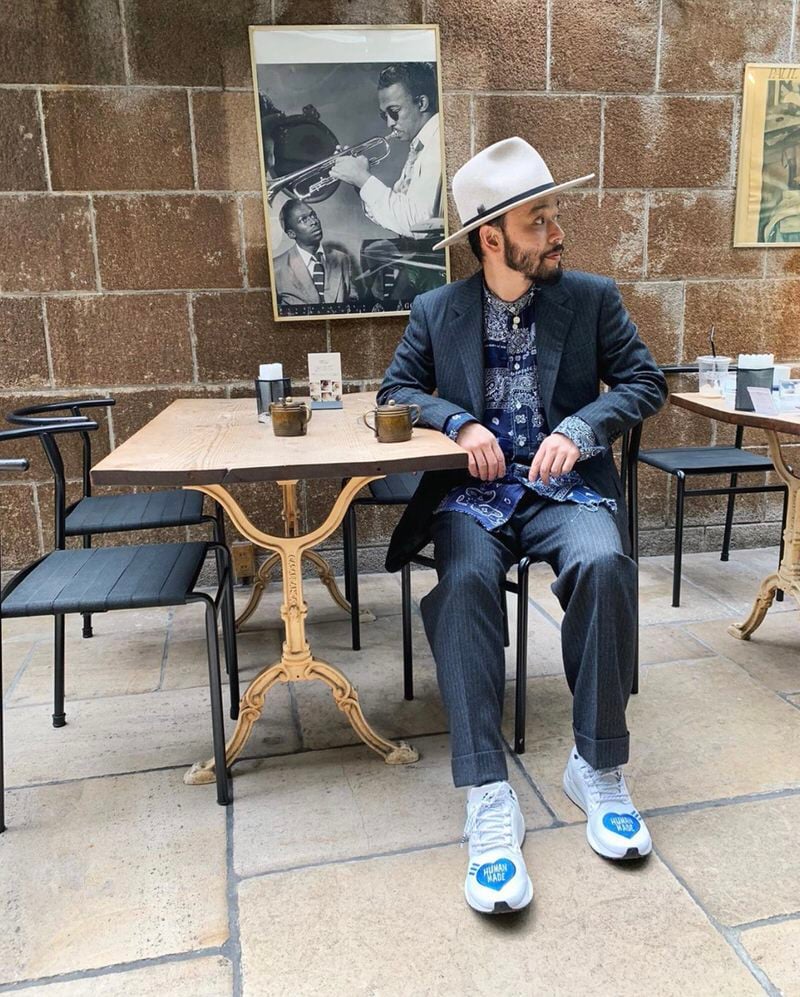 Poggy pairs a suit with the Solar Hu Glides and a paisley indigo shirt.