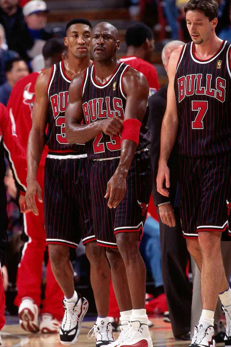 Michael Jordan in the black uniform with red pinstripes introduced in  1995-96. : r/chicagobulls