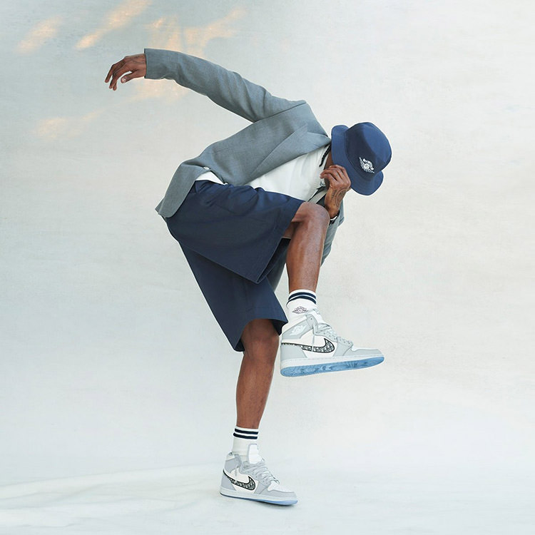 Travis Scott in Air Dior apparel and Air Jordan 1