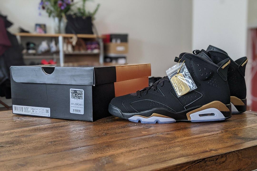 black and gold jordans 6