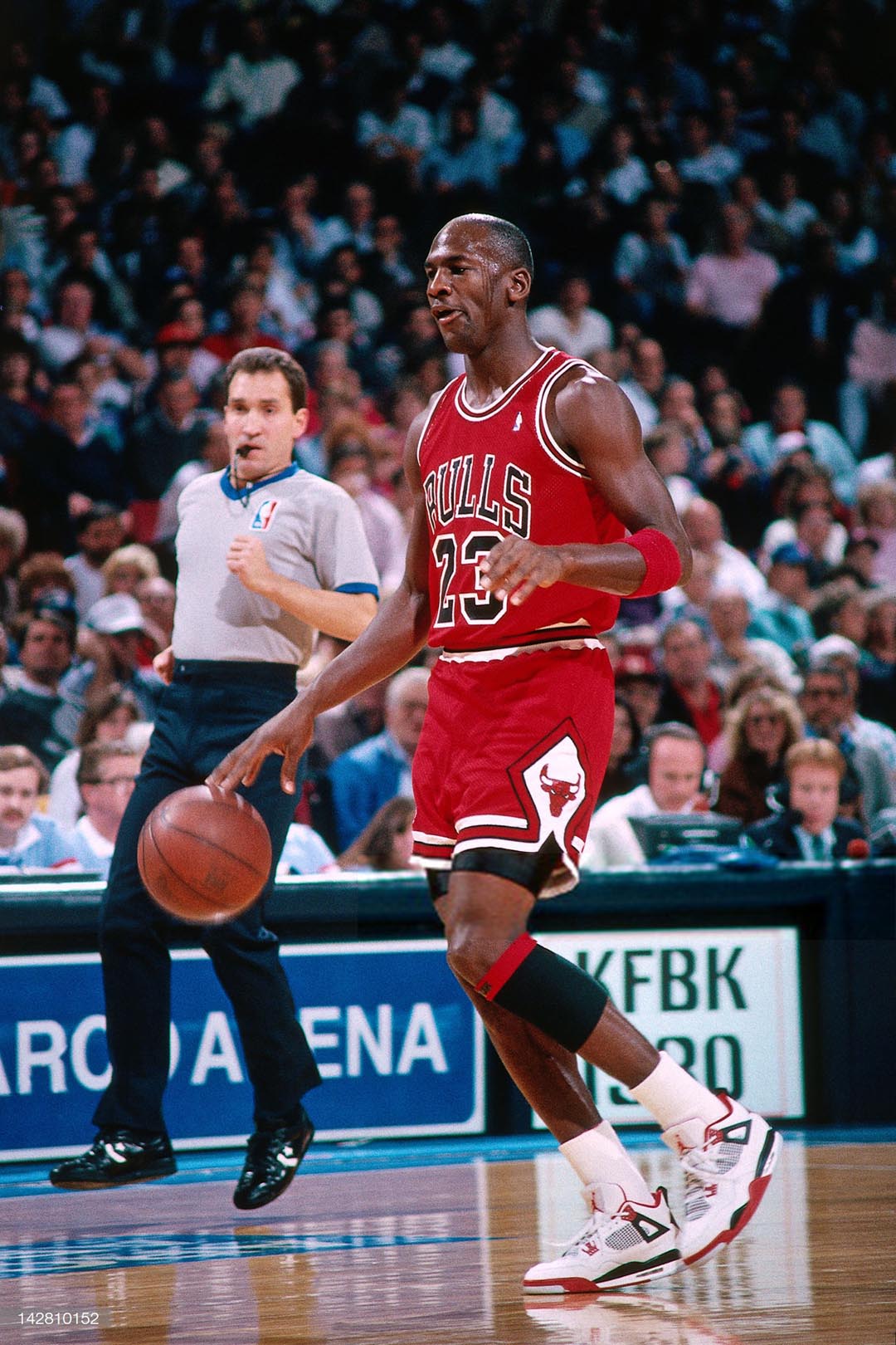 Michael Jordan wearing the Air Jordan 4 Fire Red