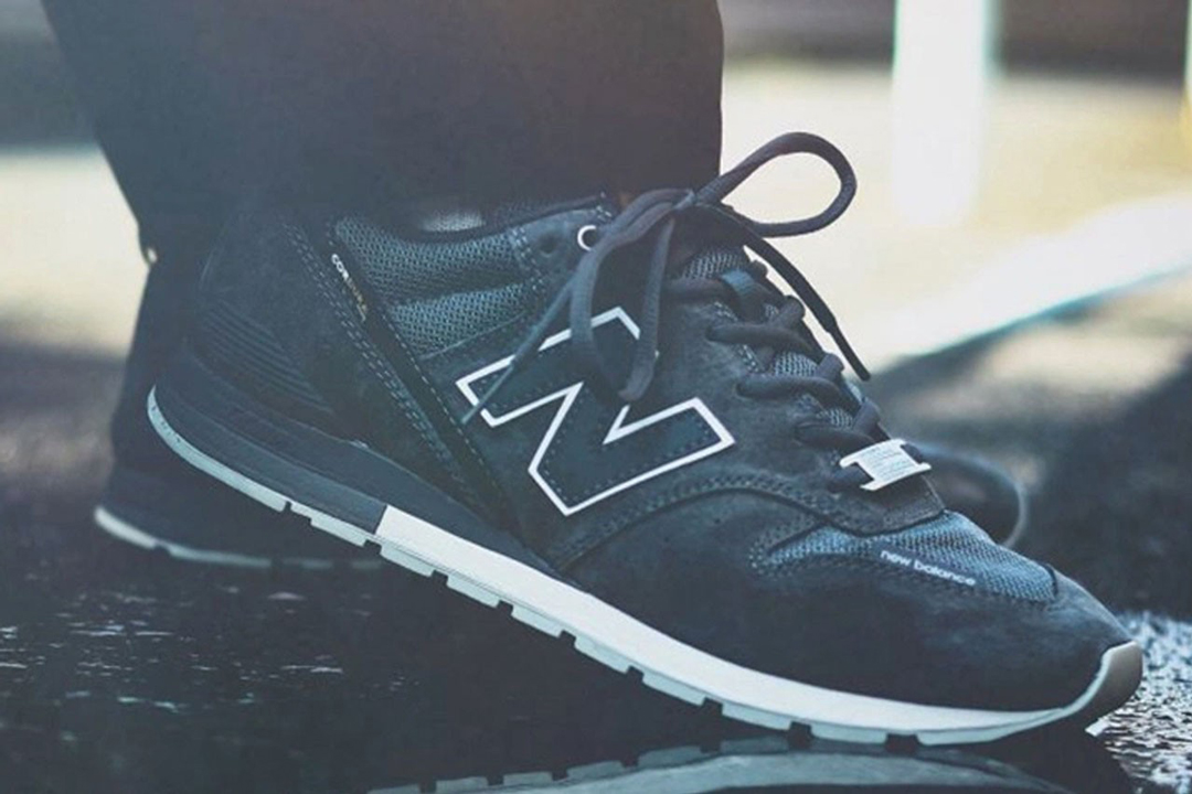 new balance 996 black leather & mesh trainers