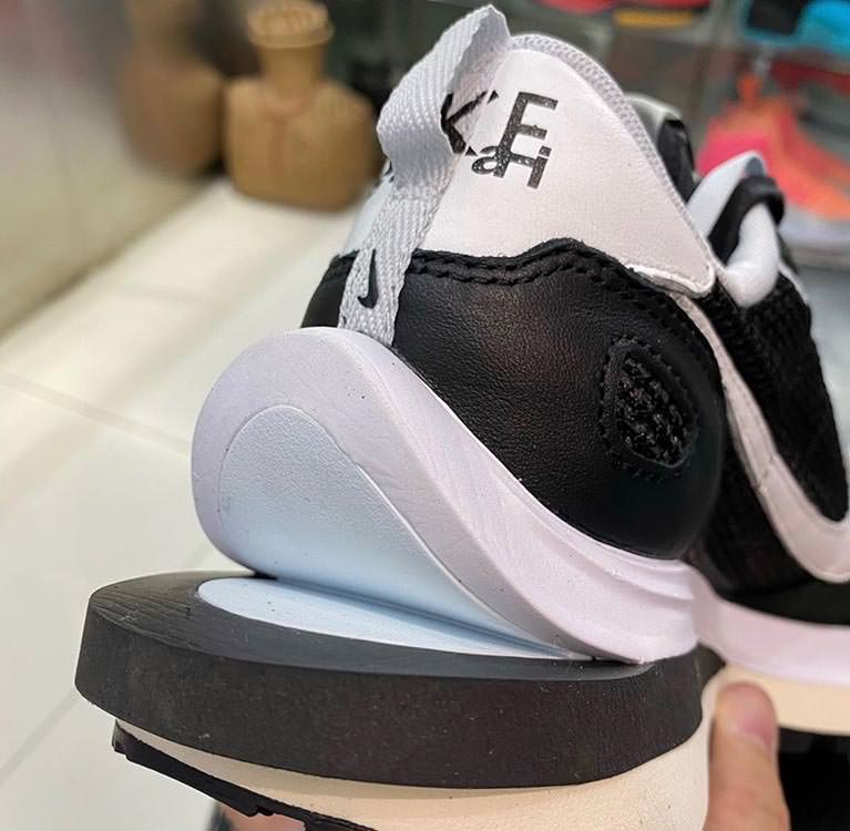 nike vapor waffle sacai black