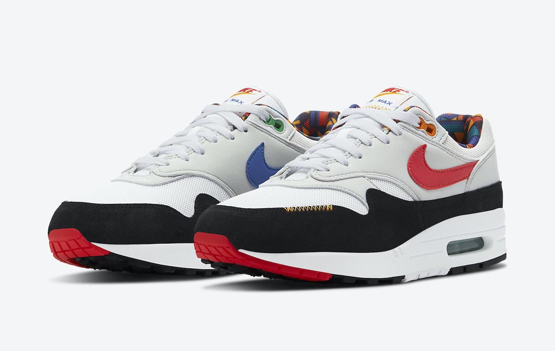 nike-air-max-1-peace-live-together-play-together-urban-jungle-gym-white-chile-red-photon-dust-astronomy-blue-university-gold-lucky-green-dc1478-100