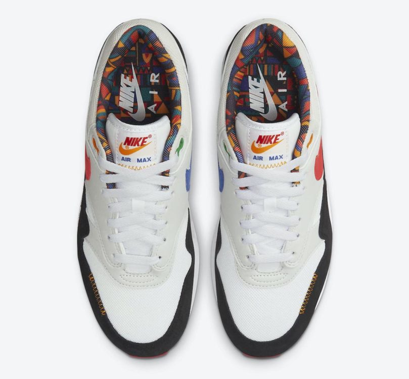 nike-air-max-1-peace-live-together-play-together-urban-jungle-gym-white-chile-red-photon-dust-astronomy-blue-university-gold-lucky-green-dc1478-100