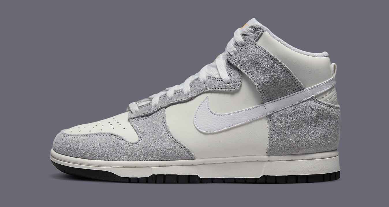 Nike Adds Silver Grey & Laser Orange Accents to the Dunk High