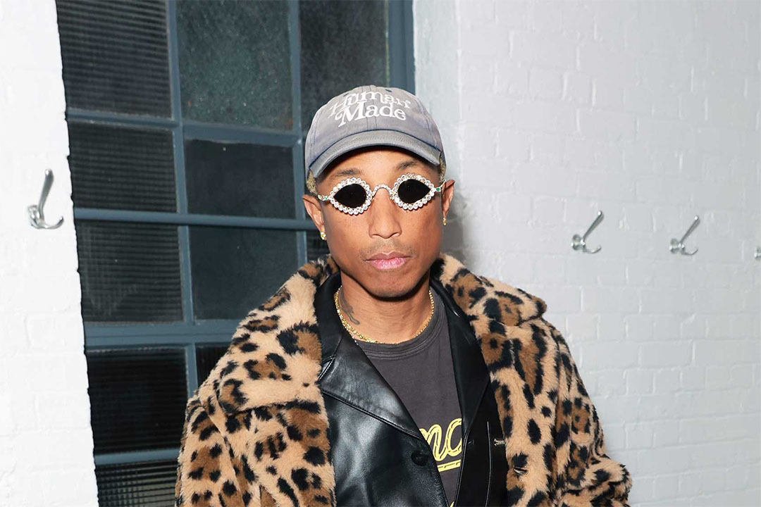 Pharrell Williams in Chanel and Adidas During Paris Fashion Week