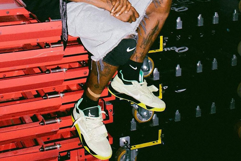 Travis Scott spotted in a new reverse swoosh Air Jordan 1, similar