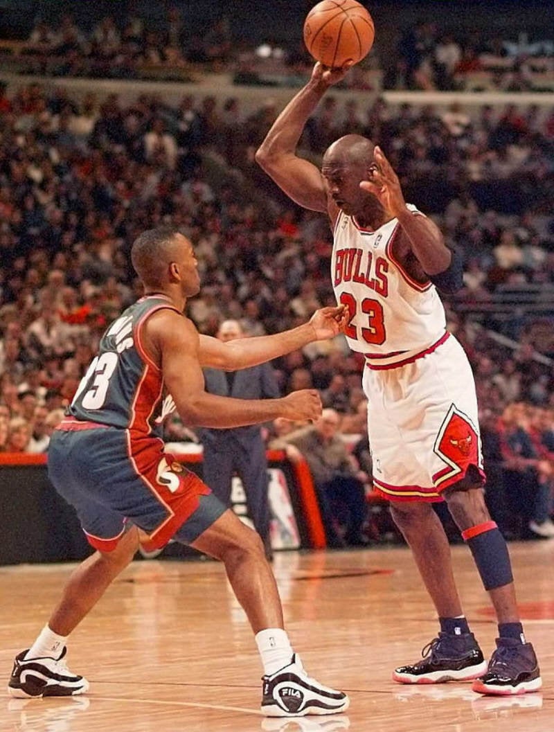 Michael Jordan wearing the Air Jordan 11 "Playoffs" in the 1996 NBA Finals