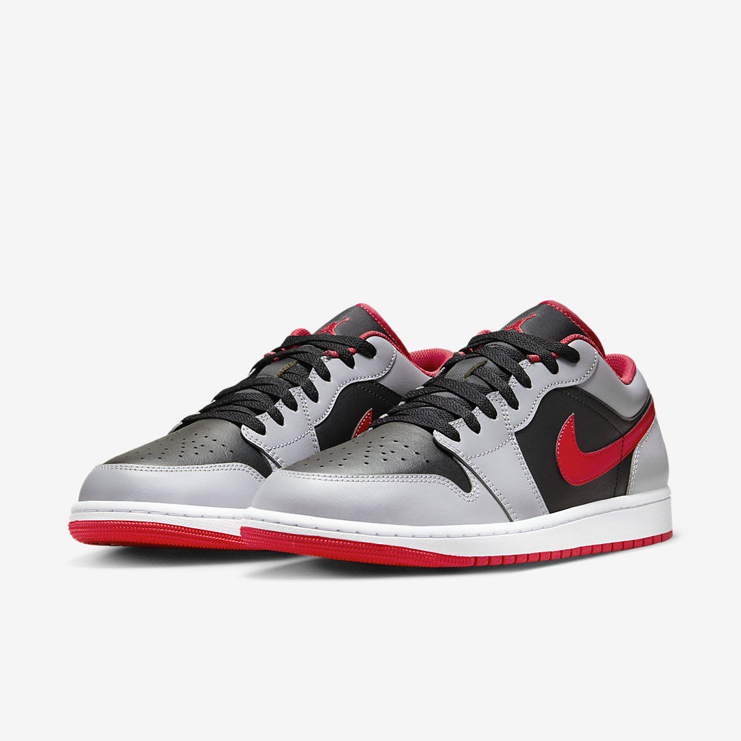 Talon Jr two-tone leather sneakers wearing "Black Cement/Fire Red" 553558-060